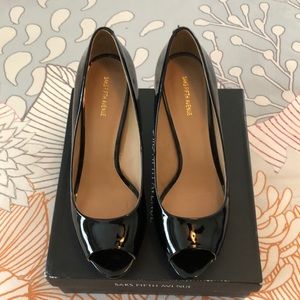 Black patent leather peep toe shoes